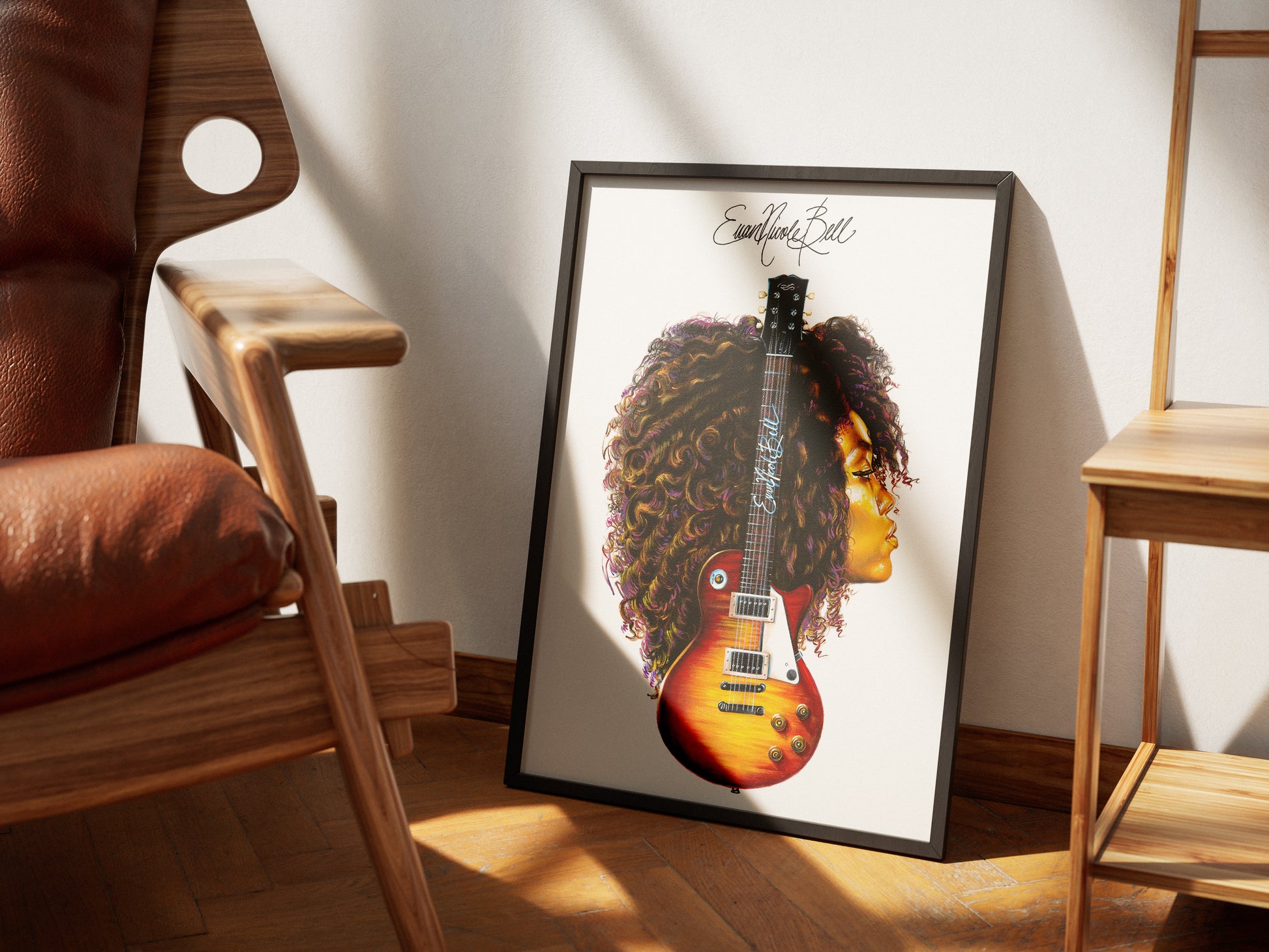 Evan Nicole Bell print in black frame and dramatic lighting