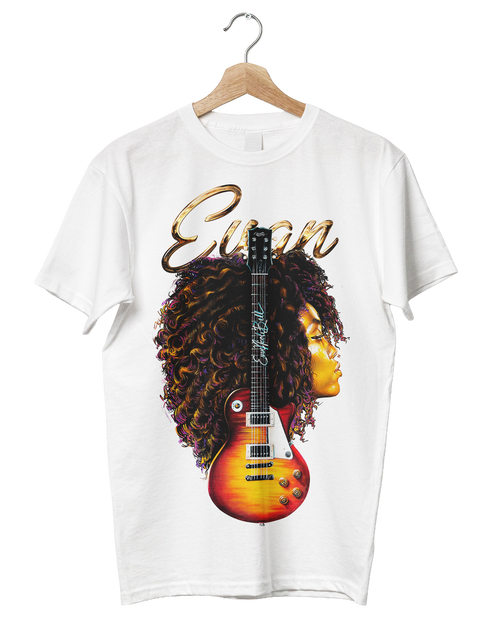 A white short-sleeve t-shirt hanging on a wooden hanger against a white background. The shirt features a large graphic print of Evan Nicole Bell with voluminous dark curly hair, a sunburst electric guitar, and the name 'Evan' in gold cursive script.